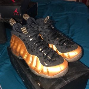 Size 8.5 Gold Nike foams